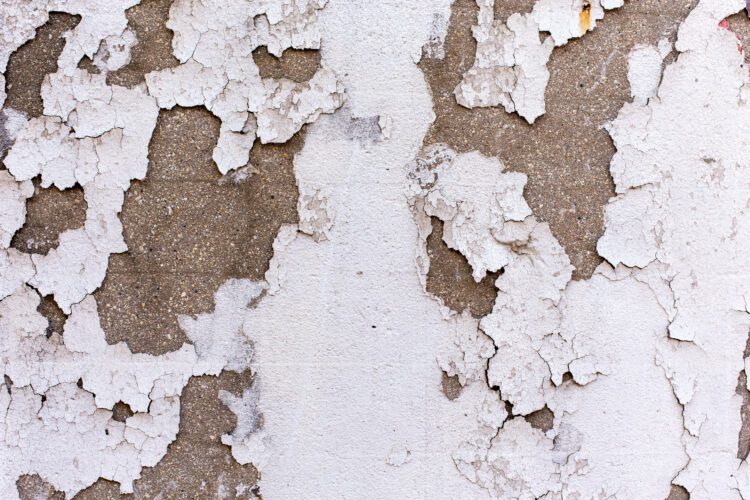 Concrete White Painted wall chipping | Lead