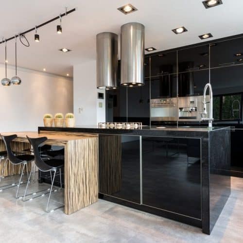 Kitchen with black painted cabinets